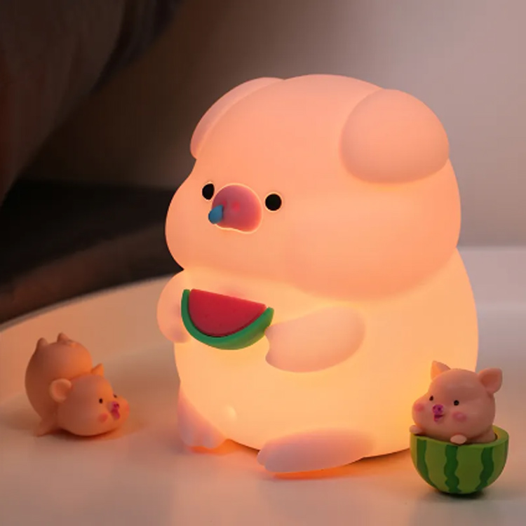 Bagaimana lampu malam babi kartun silikon meningkatkan suasana tidur kamar anak-anak?